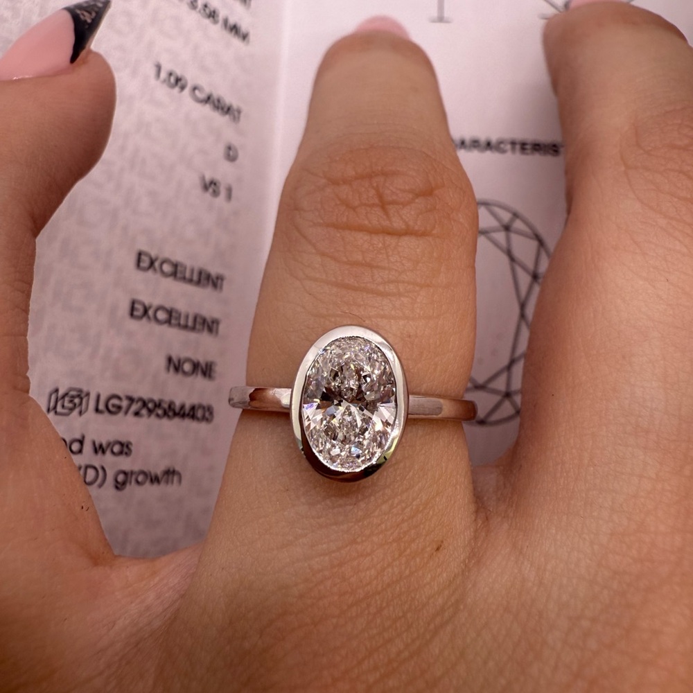 1.09 carat D VS1 oval lab diamond bezel solitaire engagement ring